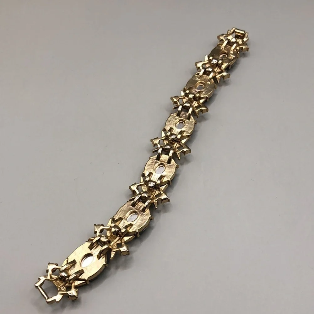 Vintage bejeweled elegant statement costume bracelet.